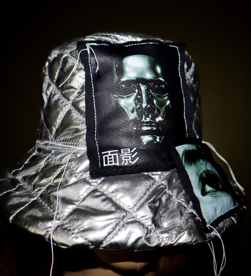 SILVER PUFF BUCKET HAT W/ EYE GRAPHICS