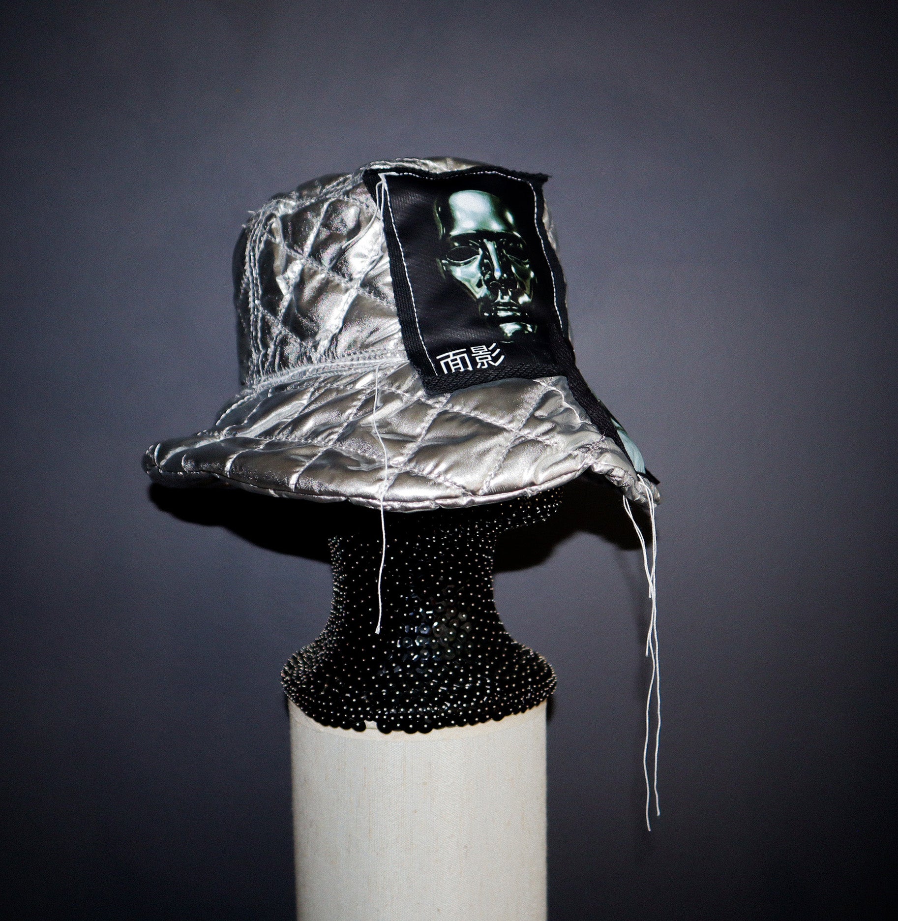 SILVER PUFF BUCKET HAT W/ EYE GRAPHICS