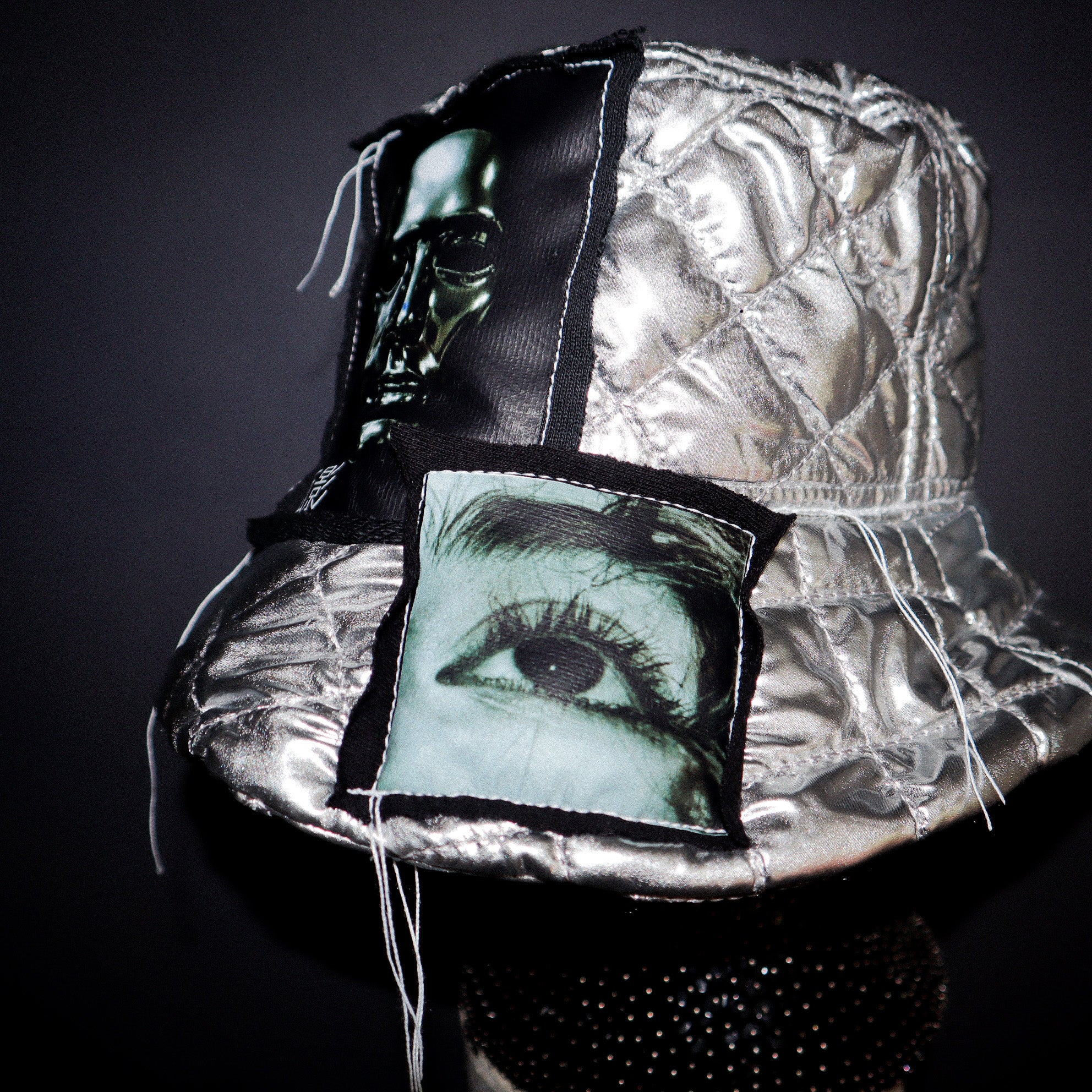 SILVER PUFF BUCKET HAT W/ EYE GRAPHICS